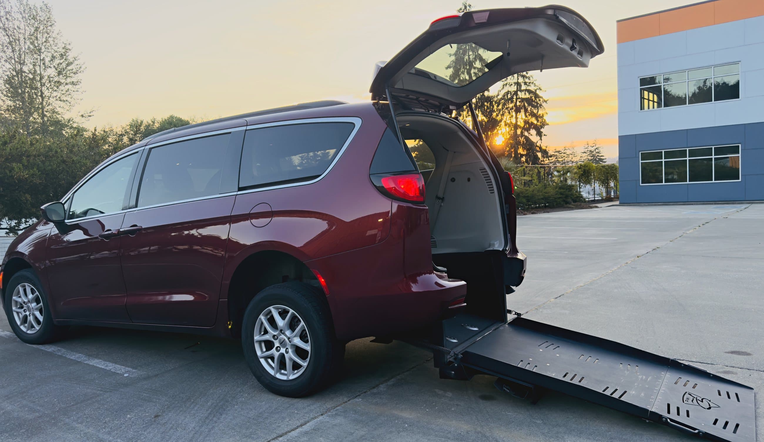 BridgeWell Mobility wheelchair-accessible van with rear ramp deployed.